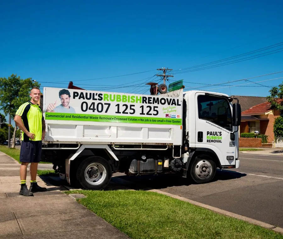 Crew beside a branded truck on a suburban street