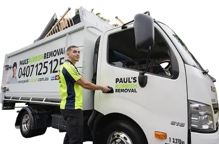Paul’s branded tipper truck with the driver in the cab
